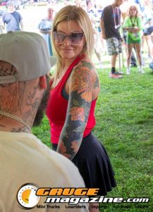 Contestants showing tattoo artwork during the Slamology 2026 Tattoo Contest on the Orion Car Audio Stage