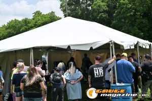 Contestants showing tattoo artwork during the Slamology 2026 Tattoo Contest on the Orion Car Audio Stage