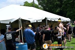 Contestants showing tattoo artwork during the Slamology 2026 Tattoo Contest on the Orion Car Audio Stage