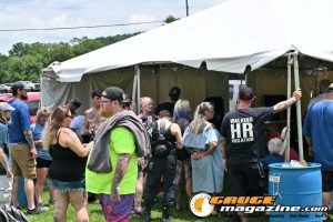 Contestants showing tattoo artwork during the Slamology 2026 Tattoo Contest on the Orion Car Audio Stage